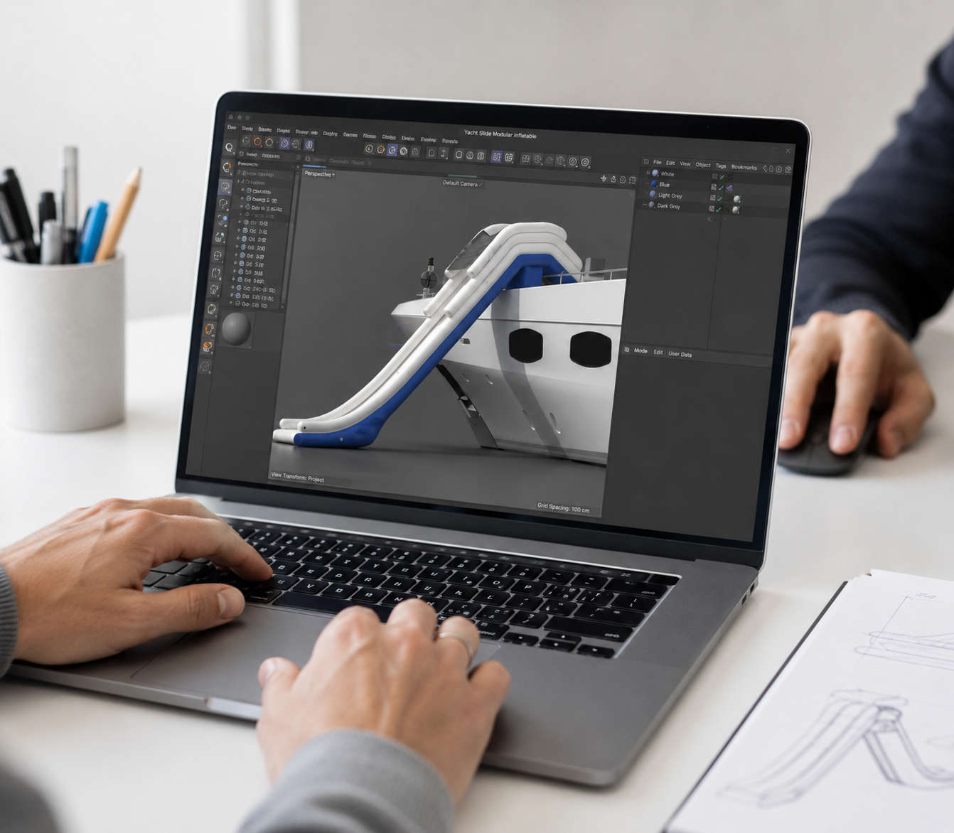 3D CAD design of a custom superyacht inflatable water slide on laptop screen